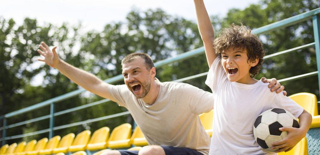 Father and Son at soccer game