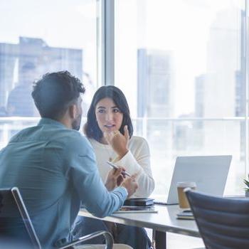 A Patelco Certified Financial Specialist provides counseling to a customer.